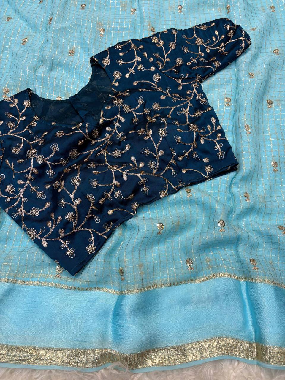 Pure viscose georgette saree with embroidered blouse